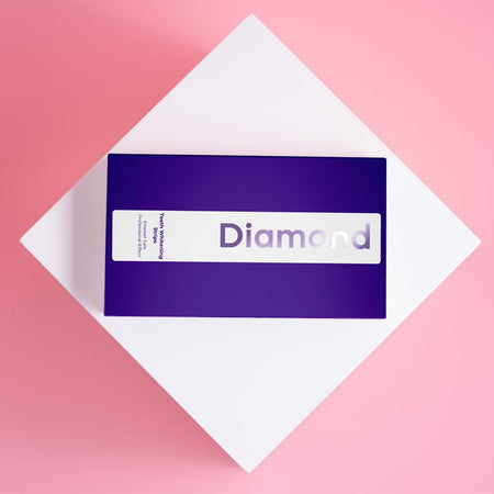 Diamond Smile paarse tandbleekstrips voor thuis bleken met witte achtergrond